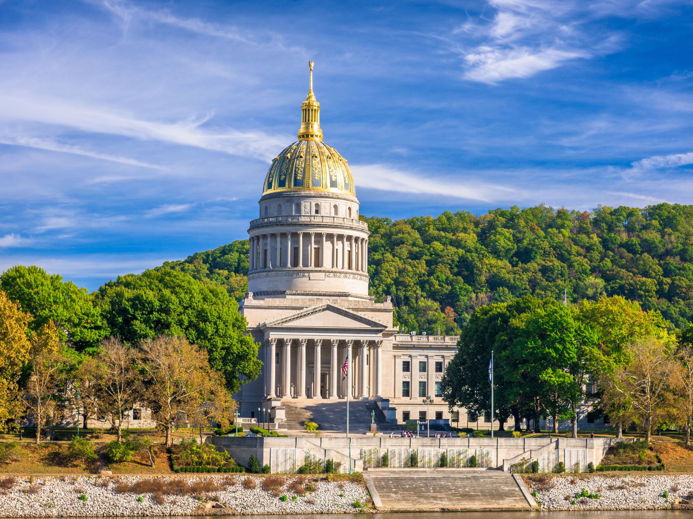 The West Virginia Capitol building sits above the Kanawha River in Charleston.